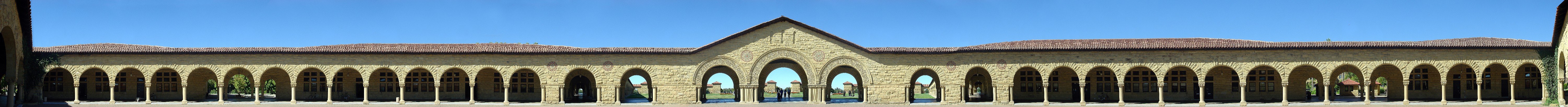 Panoramic view of the sandstone arcades of Stanford Main Quad